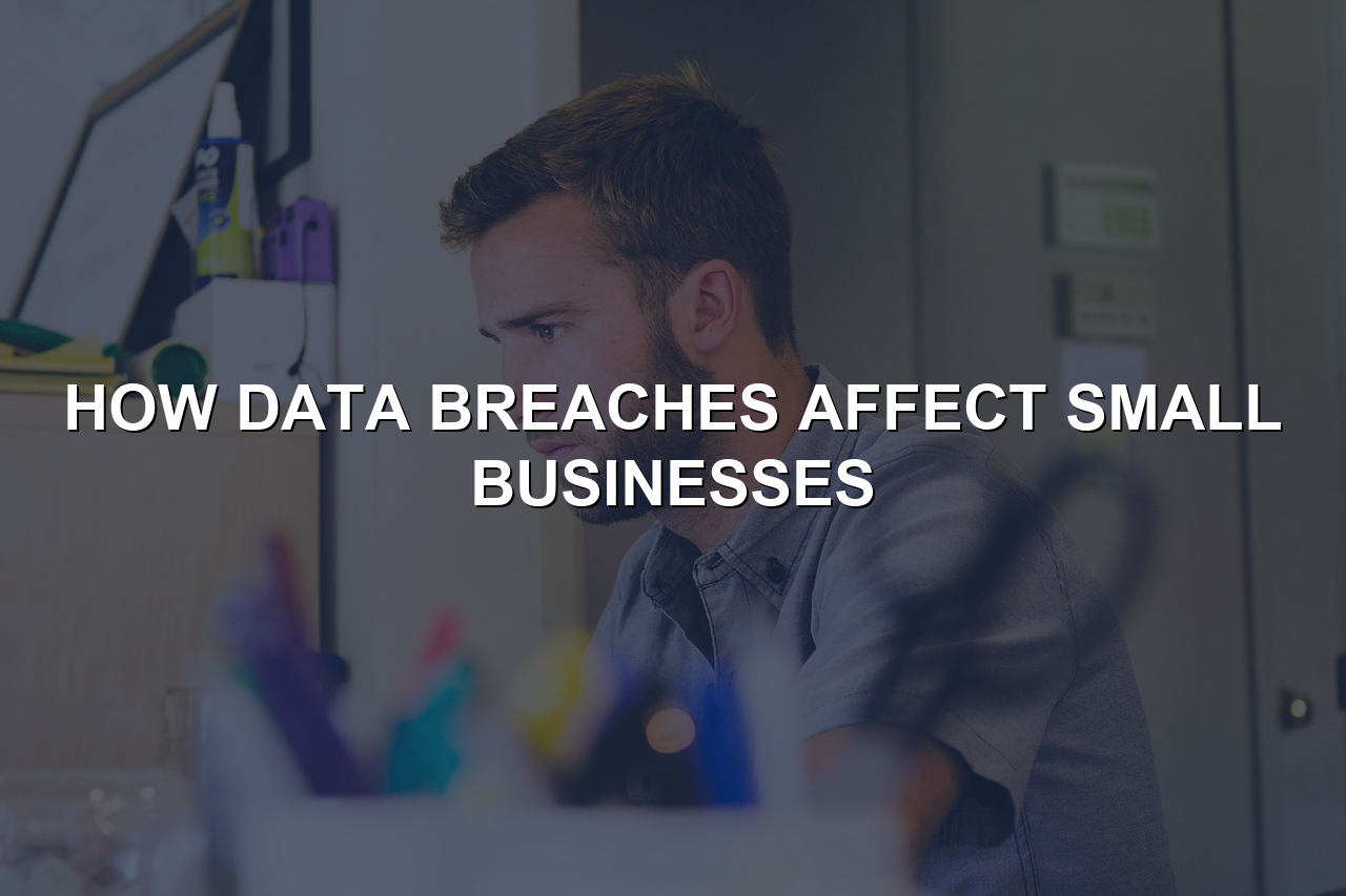 Small business owner reviewing data breach response plan on office computer