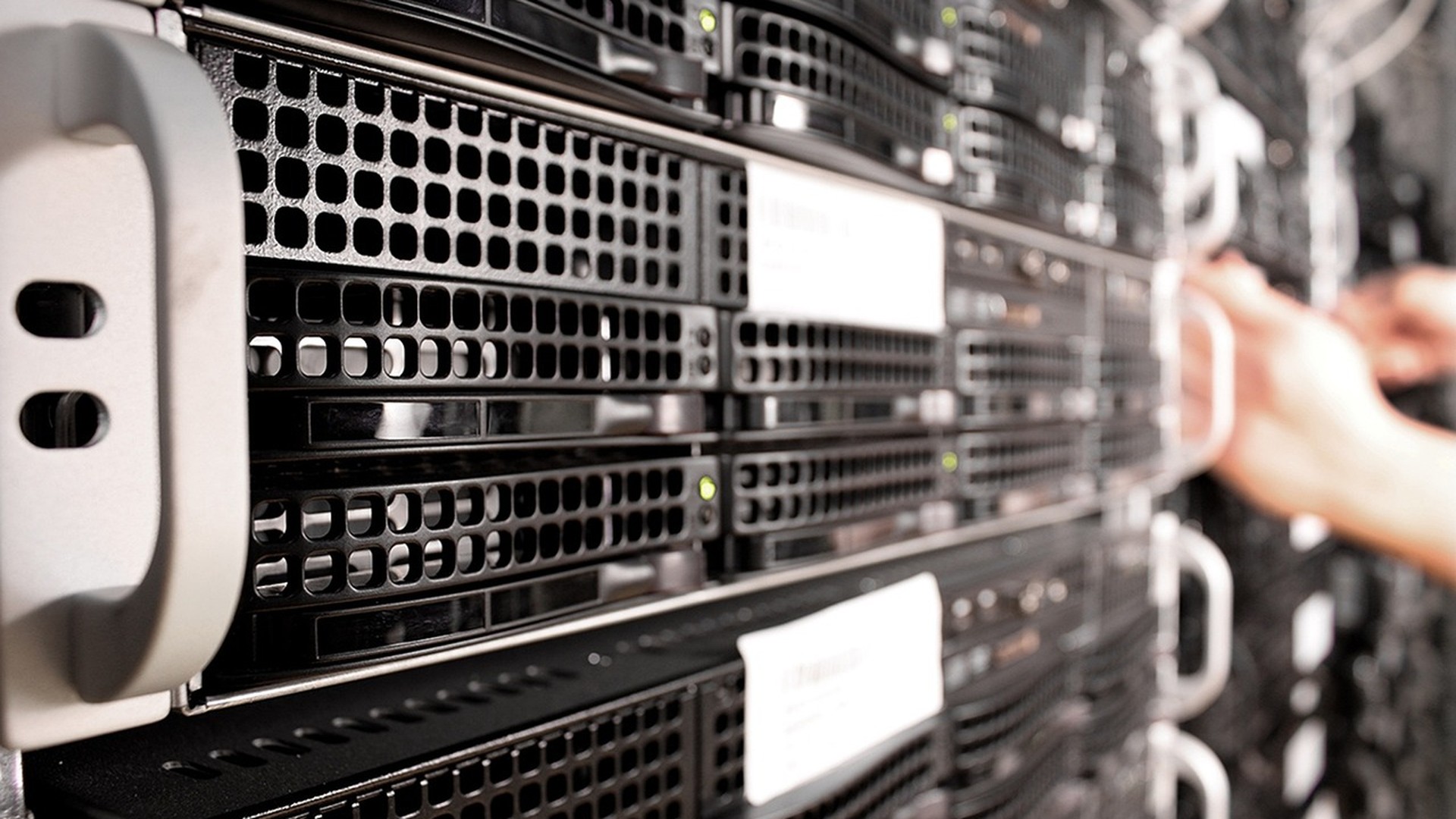 Blue-lit server racks in a modern data center