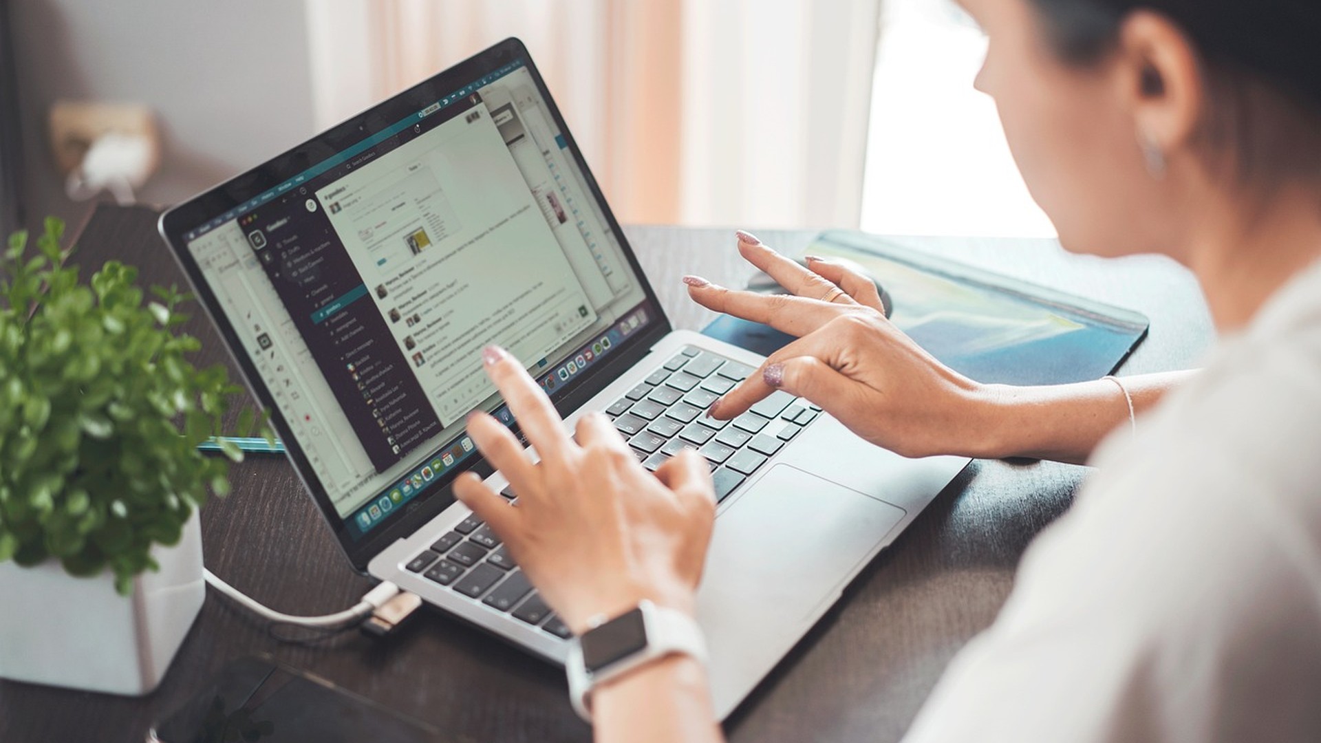 Remote worker on a laptop in a home office